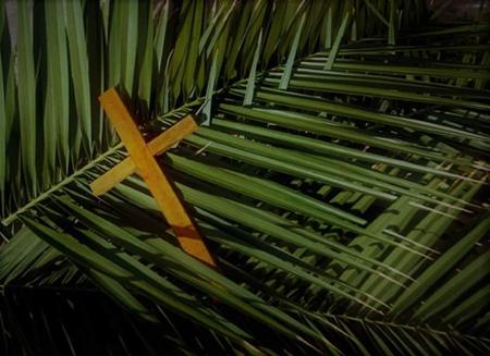 palmblaar en kruis
